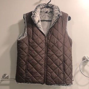 Brown vest with faux fur lining.